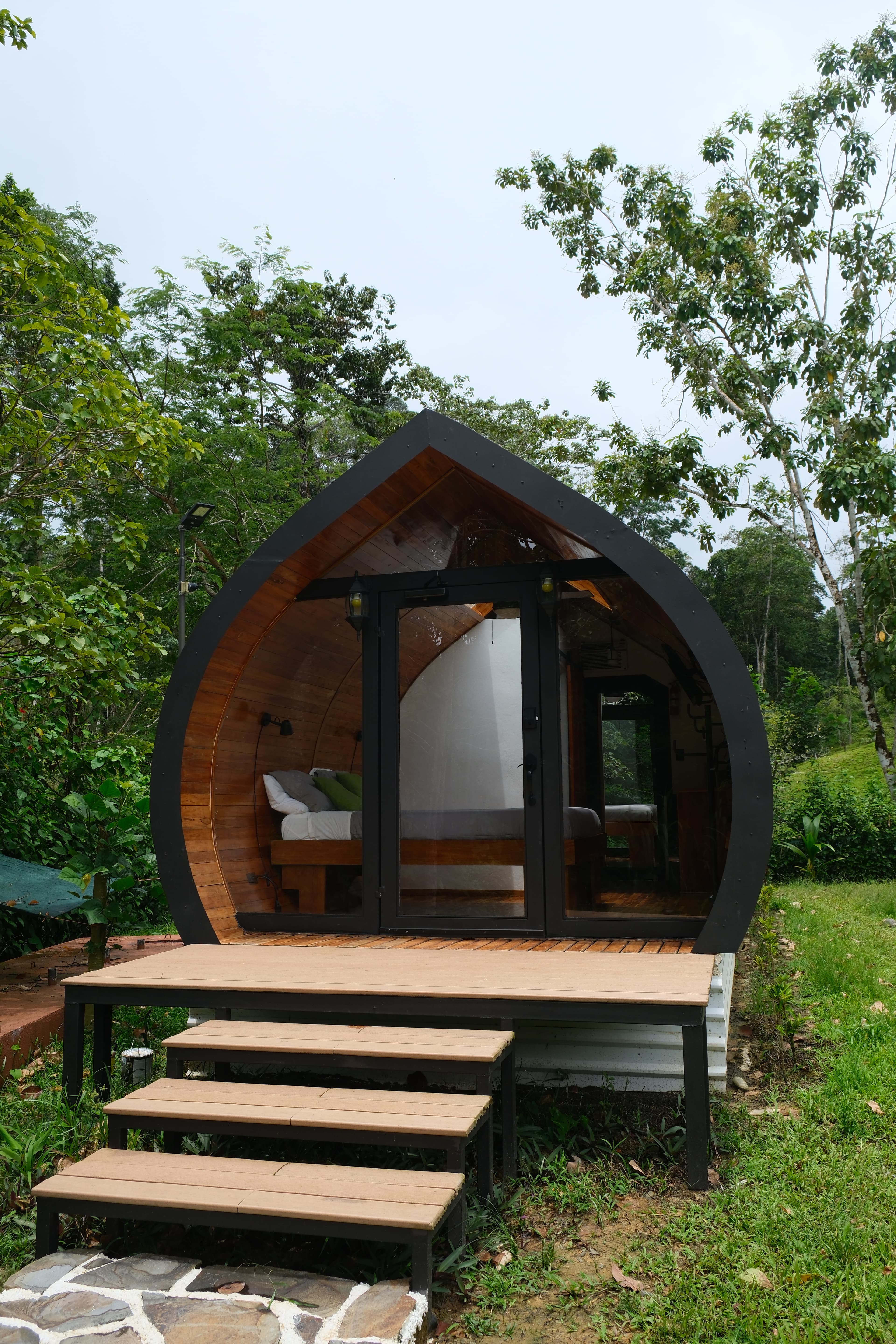 A casita from the front, steps up to its terrace