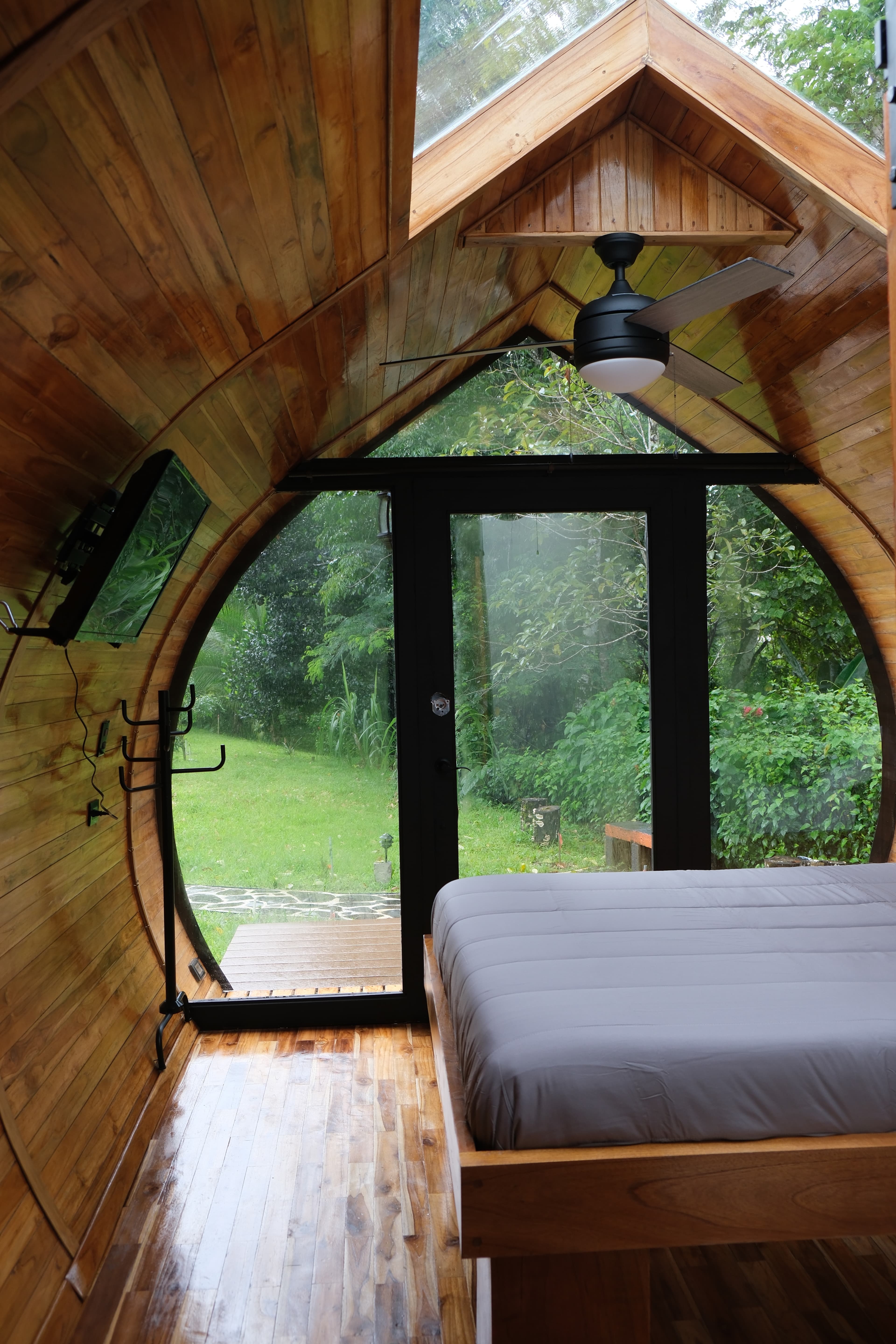 Looking out through a casita's arched front onto the garden