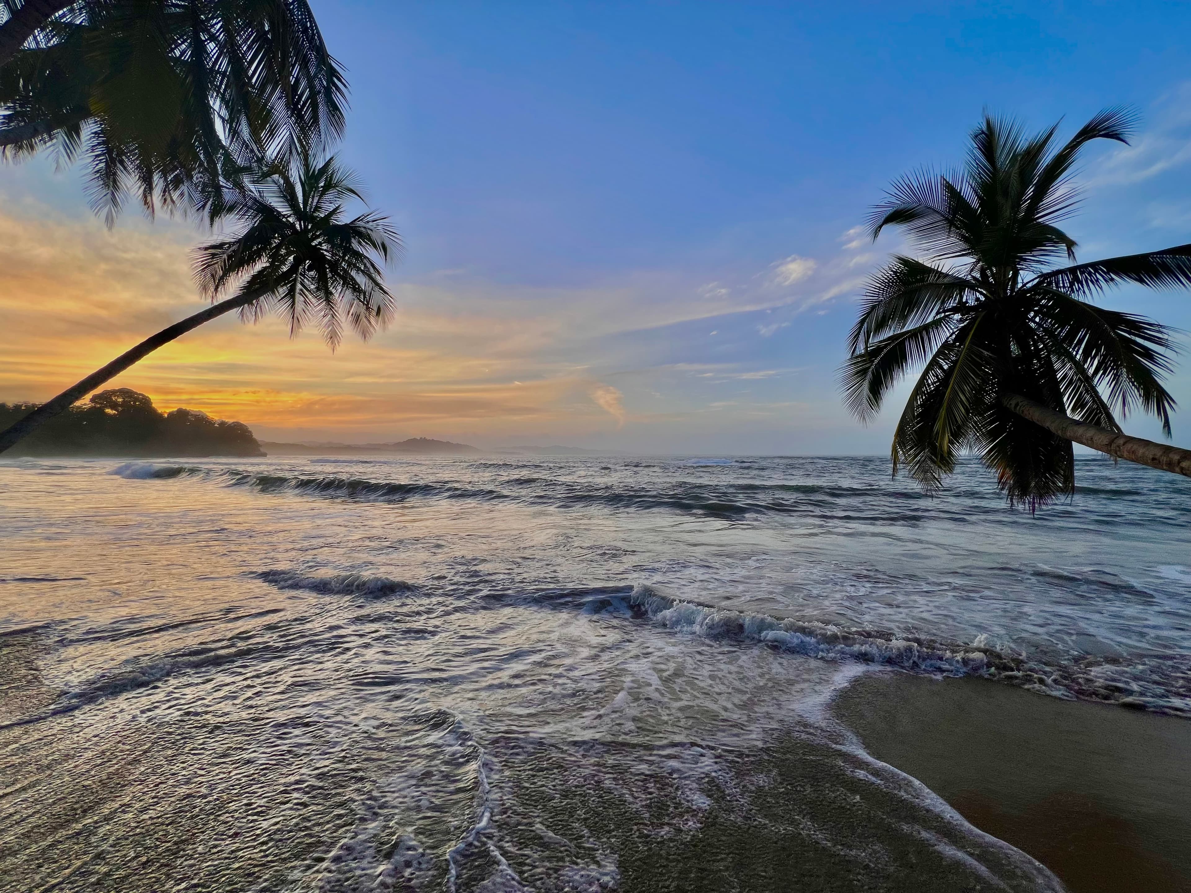 Sunset over the waves at Playa Cocles