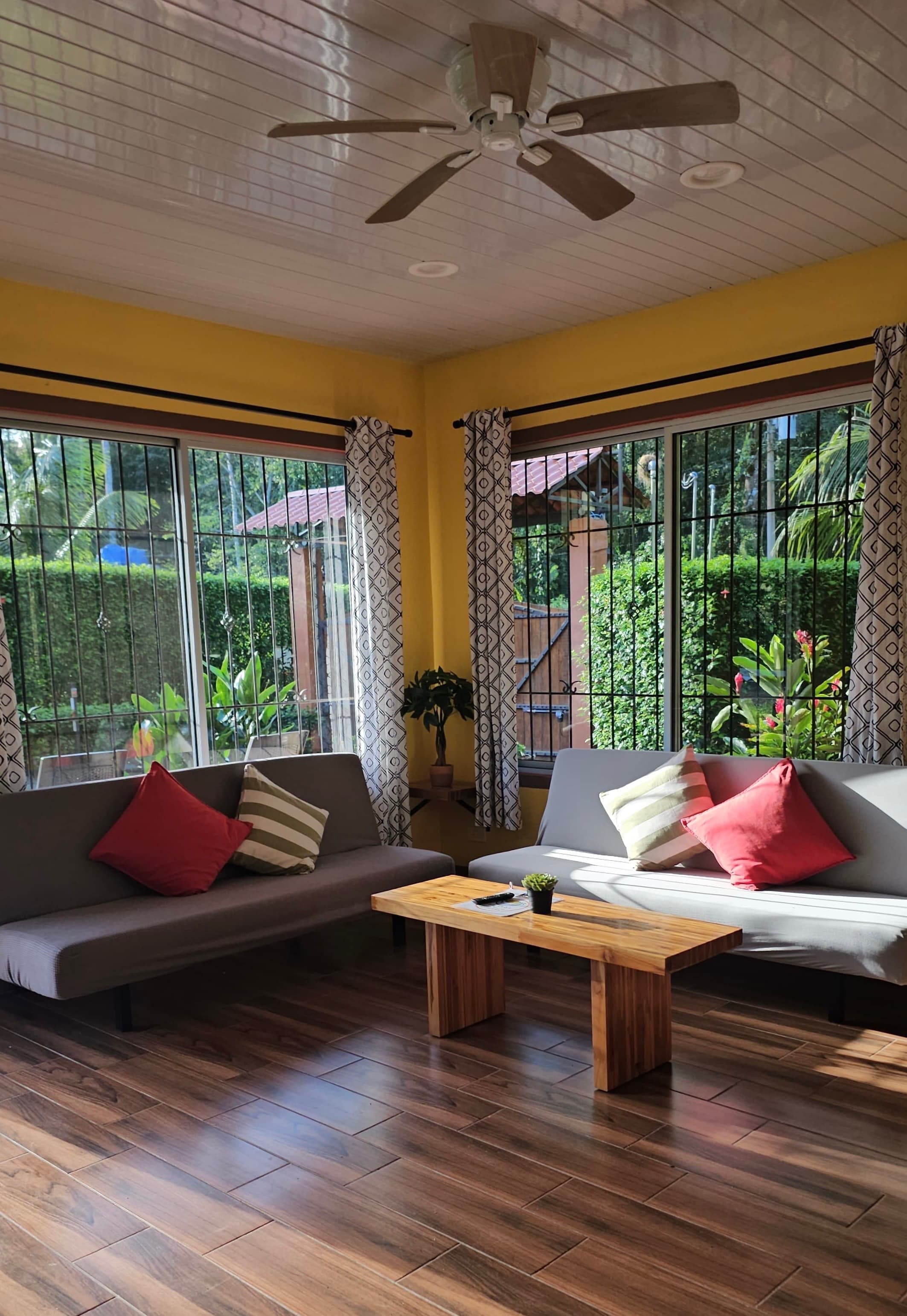 Couches by the window in the villa living room