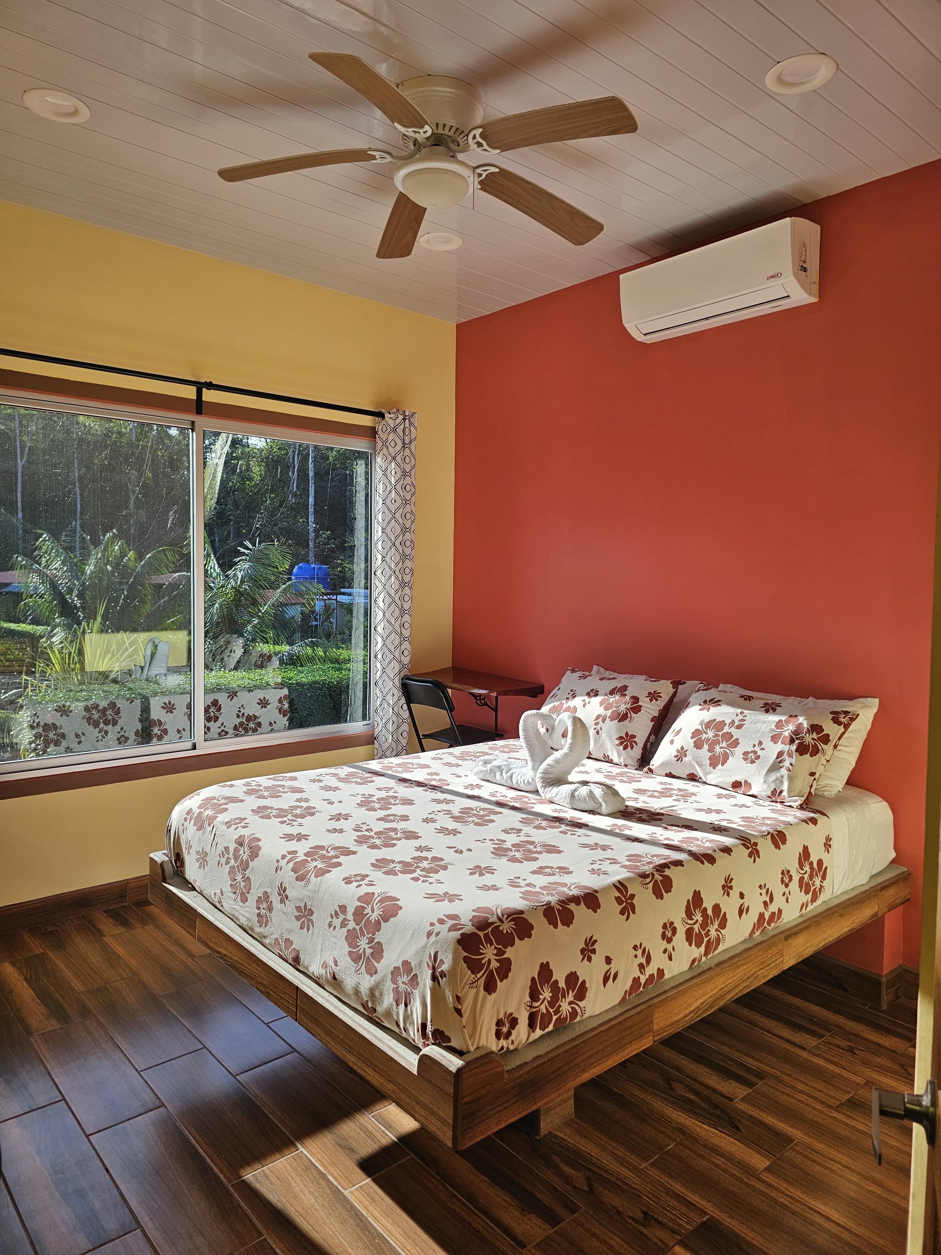 Bedroom 2, queen bed, red walls